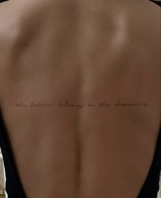 the back of a woman's body with writing on it that says, there is nothing