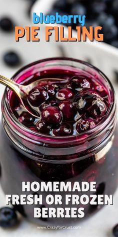 blueberry pie filling in a glass jar with fresh berries on the side and text overlay reading homemade fresh or frozen berries