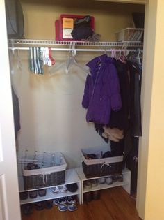 an organized closet with shoes and clothes