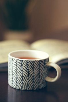 a cup of tea sitting on top of a table