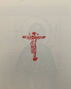 a red and white drawing of a person on a crucifix with the words jesus above it