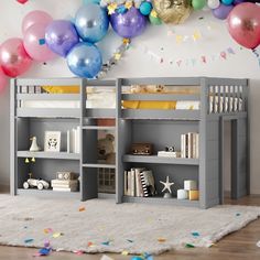 there is a bunk bed in the room with balloons