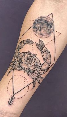 a black and white tattoo on the arm of a person with a rose, moon and arrow