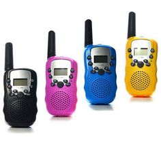 four different colored walkie talkies lined up next to each other