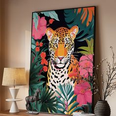 a painting of a tiger surrounded by tropical leaves and flowers on a shelf next to a lamp