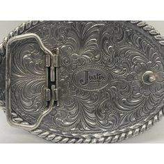 "Justin Brand Silver Tone Western Belt Buckle. This belt buckle is in fair condition with with signs of wear and scratches. Please View photos for a better description. Approximate Measurements: 2.5\"X 3.5\" Thanks for visiting, please ask any questions prior to purchasing. We ship fast and do offer combine shipping if multiple items are purchased. ----------------------------------------------------------------------------------------------------------- Disclaimer: We do our very best to descri Western Belt, Layered Bracelets, Belt Buckle, View Photos, Bead Charms, Silver Tone