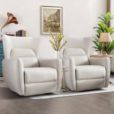 two white recliners sitting next to each other in a living room