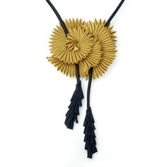 Fiber Necklace - Marrying natural inspiration and unconventional technique, artist Sophia Hu weaves polyester fibers into a necklace that entrances with a rhythmic yet refined design, mimicking the petals of a blooming chrysanthemum. Bolo-style suedecord with tassels, easily adjustable up to 34. Fiber Necklace, Natural Inspiration, Bolo Necklace, Artful Home, Chrysanthemum, Leather Cord, Jewelry Crafts, Nature Inspiration, Tassels