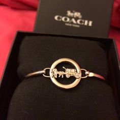 Coach Bracelet Still In Original Box Never Worn Other Than To Try On & Tag Was Taken Off Thinking I Would Keep It But Have Not Taken It Out Of The Box! Reasonable Offers Will Be Considered! Coach Adjustable Bangle, Adjustable Coach Bangle, Coach Metal Bracelet Jewelry, Coach Metal Bangle Jewelry, Classic Coach Bangle Jewelry, Coach Classic Bangle Jewelry, Coach Bracelets As Gift, Coach Formal Bracelet Jewelry, Coach Classic Bangle