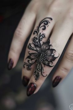 Ornate black floral henna design on a person's hand. Finger Tattoo Floral, Female Hand And Finger Tattoos, Tattoo Ideas Hands, Woman’s Finger Tattoos, Ring Finger Cover Up Tattoos For Women, Full Finger Tattoos For Women, Black Out Finger Tattoo, Dark Finger Tattoos For Women, Full Finger Tattoo