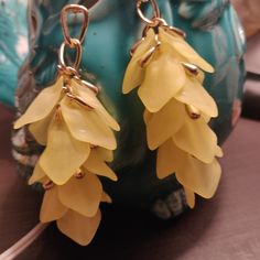 Earring With Gold Drop Yellow Jewelry With Ear Wire For Party, Party Jewelry With Yellow Ear Wire, Party Yellow Pierced Jewelry, Yellow Ear Wire Party Earrings, Single Yellow Dangle Earring, Yellow Single Dangle Earring, Elegant Yellow Dangle Clip-on Earrings, Yellow Pierced Earrings For Party, Trendy Yellow Earrings With Ear Wire