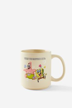 a coffee mug with cartoon characters printed on the front and sides, sitting against a white background