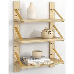 two wooden shelves with vases and books on them, one shelf is made out of wood