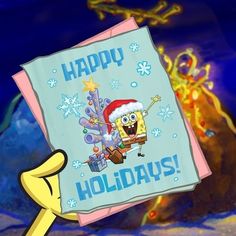 spongebob holding up a happy holidays greeting card