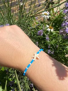 Handmade by me,  white and blue beach bracelet, delicate and beautiful 💙🤍. can be sold as is or customised, by colours, beads, charms or letters, message me if required! :) Handmade Blue Summer Jewelry, Handmade Summer Blue Jewelry, Blue Summer Style Jewelry Gift, Summer Style Blue Jewelry Gift, Summer Blue Jewelry For Beach Season, Turquoise Strand Friendship Bracelets Beachy Style, Blue Beaded Bracelets With Starfish Charm, Turquoise Strand Bracelet With Tiny Beads, Blue Beaded Bracelet With Starfish Charm