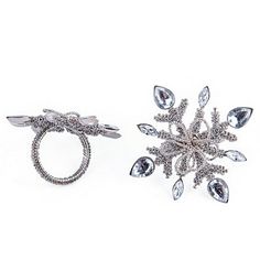 two rings and a snowflake on a white background