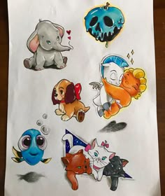 a piece of paper with stickers on it that have various cartoon characters and animals