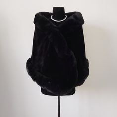 Material: Faux fur Color: Ivory or Black Size: One size fits all The fabric is soft and silky, the fluff is full, and the color is black and bright. The style is a very classic rounded corner design, lengthened and thickened, and has a strong warmth retention. Shipping time: 20 working days We accept returns. Washing not supported. Black Evening Shawl, Black Dress With Shawl Formal, Winter Evening Faux Fur Coat, Elegant Fur Coat With Faux Fur Trim For Wedding, Winter Wedding Fur Coat With Faux Fur Trim, Elegant Wedding Fur Coat With Faux Fur Trim, Elegant Winter Wedding Fur Coat, Elegant Evening Cape For Winter, Elegant Fur Cape Coat With Faux Fur Trim