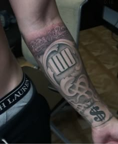 a man with a tattoo on his arm