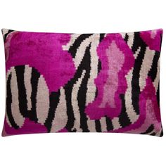 a pink and black pillow with zebra print