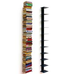 two bookshelves are next to each other on the wall, one is filled with books