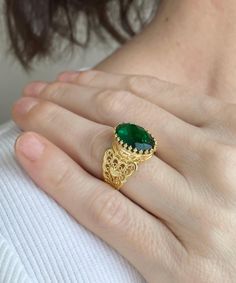 Gold Emerald Edwardian Silver Heart Ring, 925 Sterling Silver Green Quartz Gemstone Artisan Handmade Filigree Boho Women Statement Ring Dainty cocktail ring, boho wedding gift, victorian jewelry, gift ring for her, September birthstone, oval statement ring, ancient Egypt ring, birthday gift her, vintage gold ring, trendy women ring Material: 925 Sterling Silver with 18K Gold plated ( NICKEL FREE ) Gemstone: Emerald 10x14 mm. FREE, FAST AND TRACKABLE SHIPPING FOR ALL EU COUNTRIES AND USA. Elevate your elegance with the epitome of luxury - the Gold color Emerald Edwardian Silver Heart Ring. Crafted with precision and passion, this exquisite piece of jewelry is a testament to artisan craftsmanship and timeless beauty. Made from the finest 925 sterling silver, it showcases a resplendent green 22 Karat Gold Rings, Oval Gemstone Heart Ring As Gift, Oval Gemstone Heart Ring For Gifts, Traditional Oval Emerald Ring, Green Emerald Ring With Intricate Design For Gift, Filigree Ring For May Birthstone Gift, May Birthstone Filigree Ring Gift, Emerald Filigree Ring Gift, Emerald Ring With Filigree For Gift