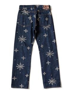 a pair of jeans with snowflakes on them