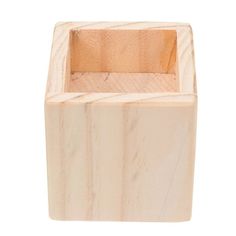 a wooden block with a square section cut out in it's center, on a white background