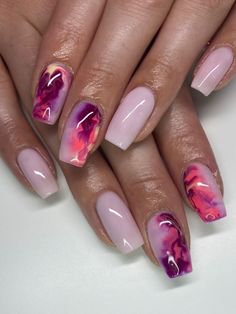 Marble nails have become a trend that continues to captivate nail enthusiasts, and combining pink with this design is a chic way to celebrate fall. Pink marble nails often mix shades of pink with white and grey swirls to create a unique and artistic look. The marble effect brings elegance and creativity to your nails, while the pink color keeps it feminine and stylish. Whether you opt for a full marble set or just a few accent nails, pink marble nails are perfect for adding a touch of luxury to Plum Marble Nails, Marbled Gel Nails, Marbled French Tip Nails, Winter Marble Nails, Marble Nail Designs Summer, Marble Gel Nail Designs, Maroon Marble Nails, Color Marble Nails, Marble Toe Nails