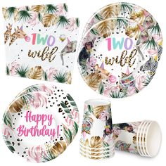 two wild birthday party supplies including plates, napkins and cups with tropical print on them