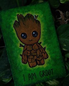 a painting of a baby groote with the words i am groot on it