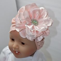 This turban hat is the perfect accessory for the stylish baby girl in your life! It is made of one layer of stretchy Soft Lace fabric. The flower is made of satin fabric and with decoration in the center. Since our products are handmade at the time of order, it is our pleasure to accommodate it to your liking, so do not hesitate to contact us if you wish to make any changes to the product. The sizes for the Turbans and Headbands are are the same as below; -----------------SIZING----------------- Lace Turban, Stylish Baby Girls, Turban Hat, Satin Flowers, Flower Lace, Stylish Baby, Turbans, Pink Bow, Lace Fabric