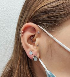 a woman with ear piercings on her ears