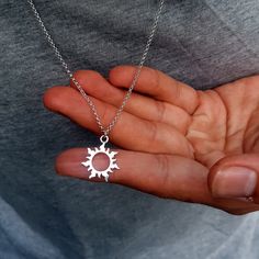 ♥ This delicate necklace is perfect for women or men that want a little chic, minimalist sparkle. This is a Sterling Silver sun charm necklace. Both the charm and the necklace are Sterling Silver. This necklace is great as a gift for a man or a boy. Please look at the measurements of the charm before ordering. Photos can sometimes make charms appear larger or smaller than they actually are. Measurement of Charm in mm: 18mm Measurement of necklace length in Inches: You will be able to select a 16 Sun Jewelry Men, Best Necklace For Men, Silver Chain With Pendant Men, Cool Mens Necklace, Lockets For Man, Mens Charm Necklace, Silver Pendant Necklace Men, Men Charm Necklace, Guys Jewelry Necklaces