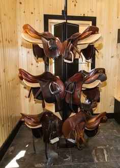 there are many different types of saddles on display