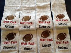 six personalized hand towels with footballs on them