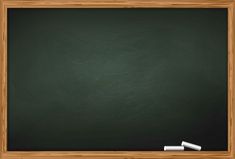 a blackboard with chalk and eraser on it in front of a wooden frame