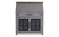 a gray cabinet with glass doors and drawers