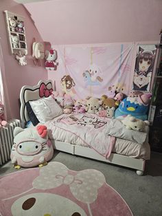 a hello kitty themed bedroom with pink walls