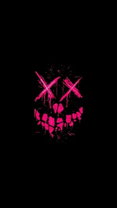 a black background with pink paint splattered on the face and crossbones