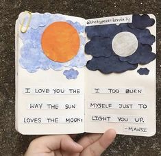 someone is holding an open book with writing on it that says i love you the sun, myself just to loves the moon