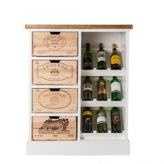 an open cabinet filled with wine bottles and wooden boxes