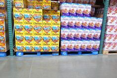 boxes of cereal are stacked on the shelves