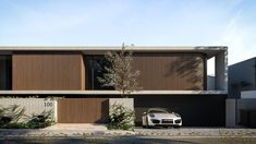 a car is parked in front of a modern house with wooden shutters on the windows