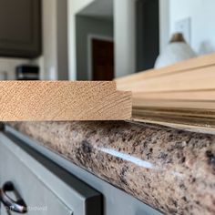 a close up view of some wood in the kitchen