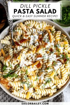 a bowl filled with pasta and cheese on top of a table