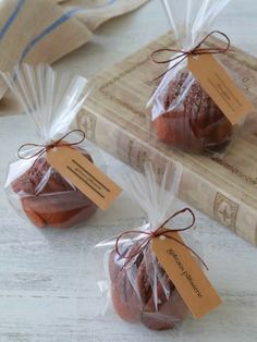 two bags of cookies sitting on top of a table