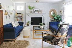 a living room filled with furniture and a fire place