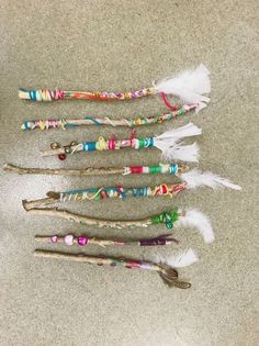 five toothbrushes are lined up on the floor