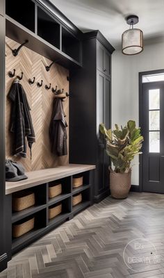 the entryway is decorated in black and wood